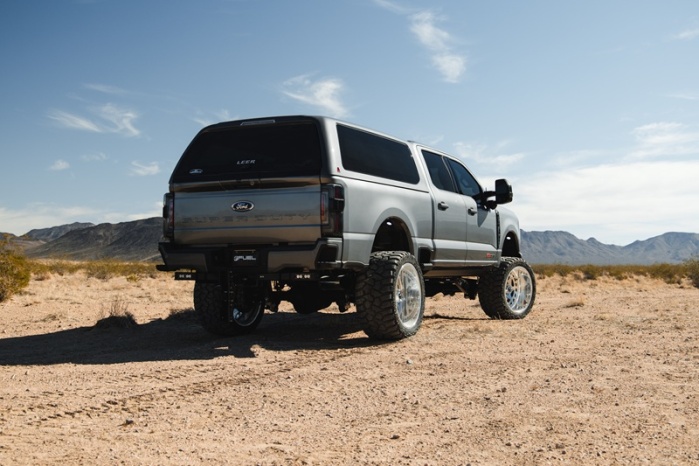 LEER fiberglass truck cap installed on a pickup truck