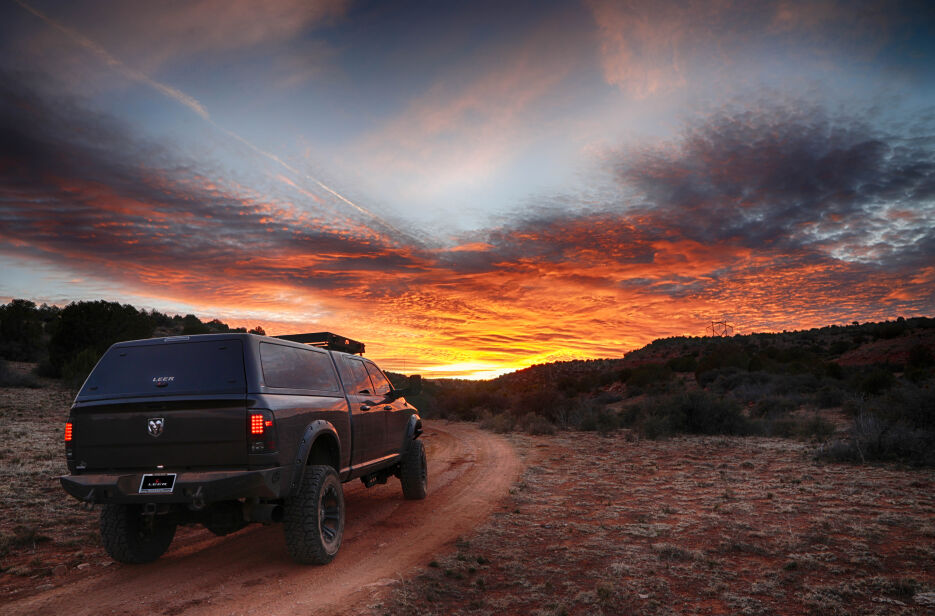 LEER-100XQ-Chevy-2500-2018-black-PS-3-4-Rear-Sunset.jpg