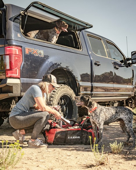 Dog in truck bed with cap 2025