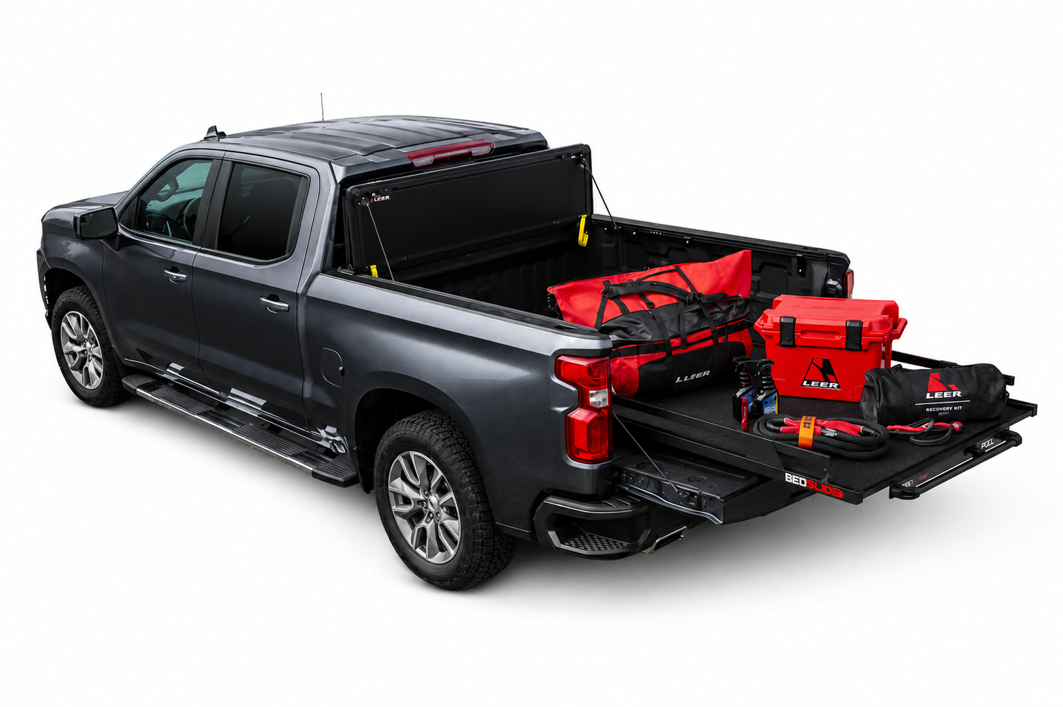 LEER HF650M folded upright with truck-bed cargo accessories