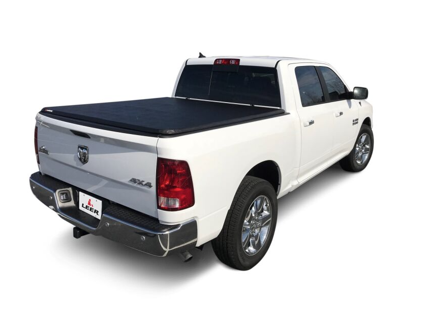 LEER Latitude soft folding tonneau cover installed on a white Ram pickup