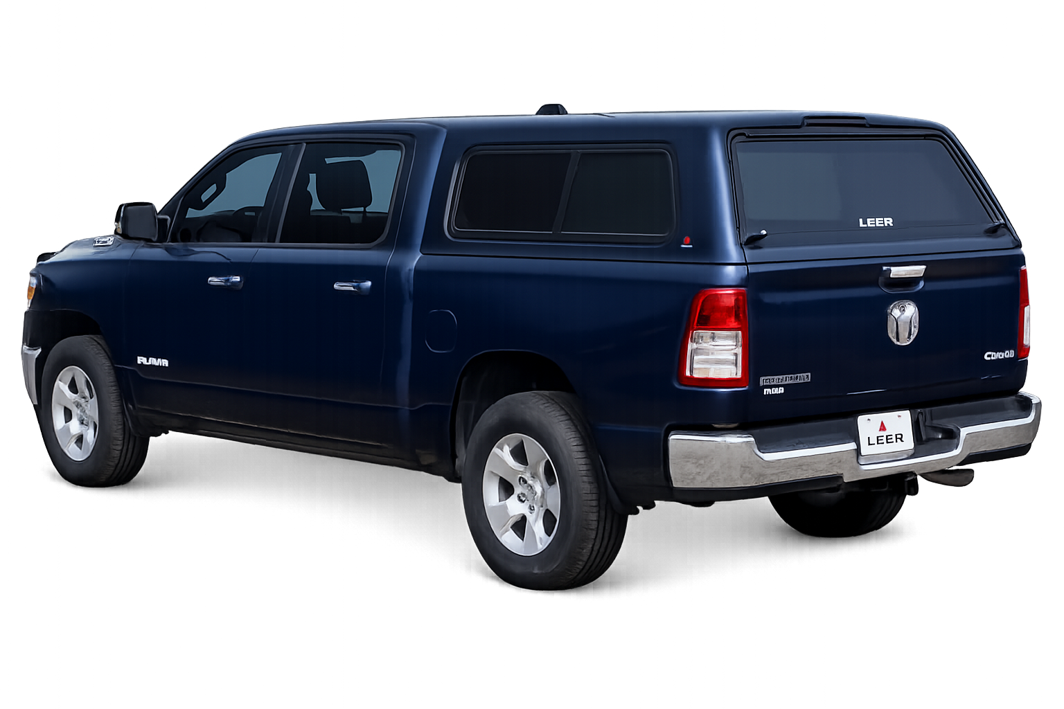 Dark blue RAM pickup with a LEER 100R fiberglass truck cap