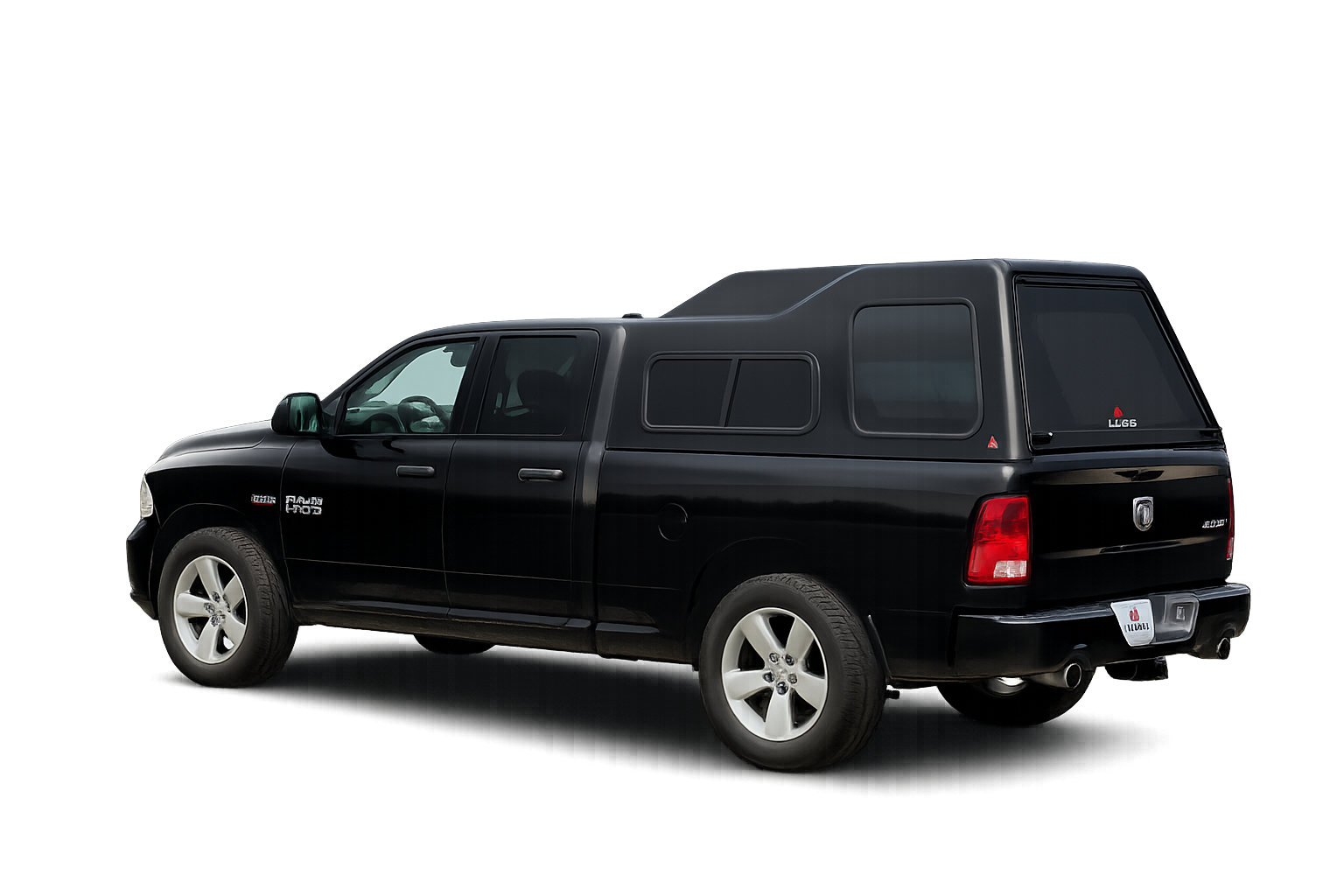 Black RAM pickup with a LEER 122 fiberglass truck cap